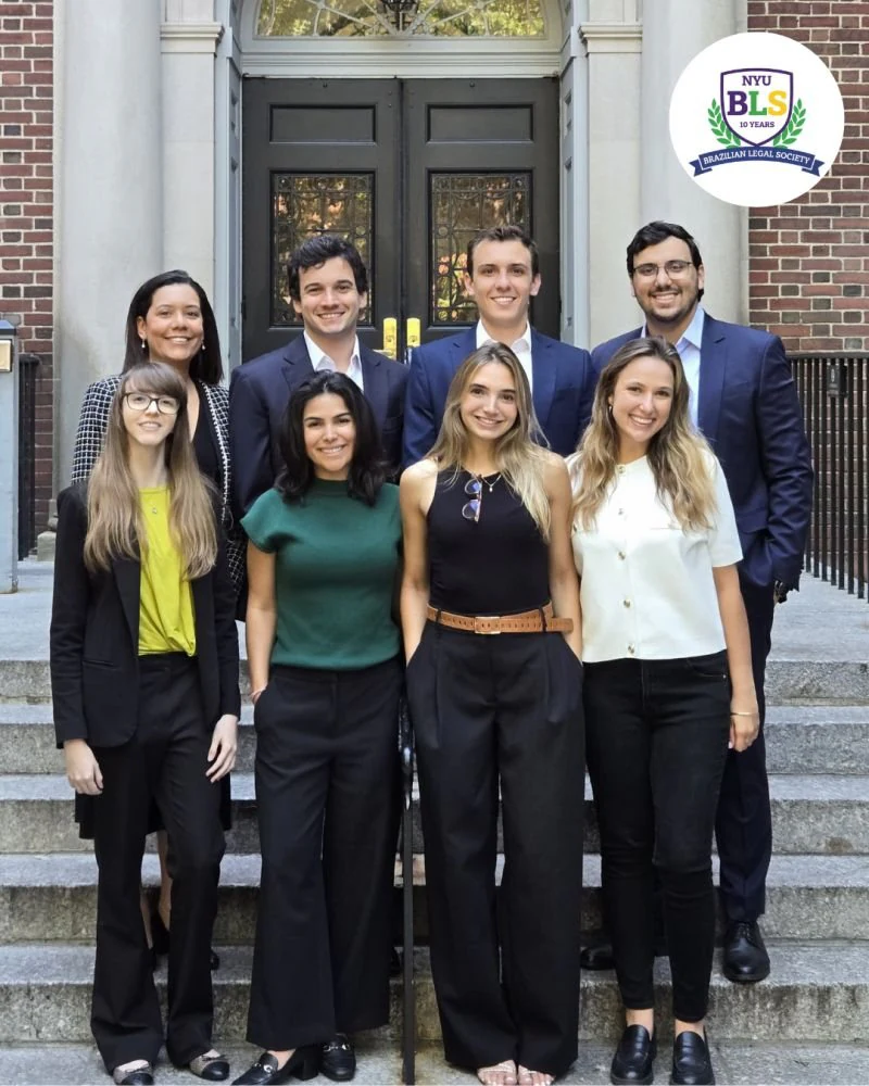 The 2025/2026 BLS Executive Board, standing together on the steps of a building entrance