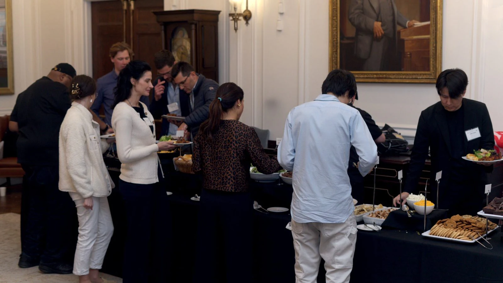 Guests at the networking lunch buffet, 9th conference